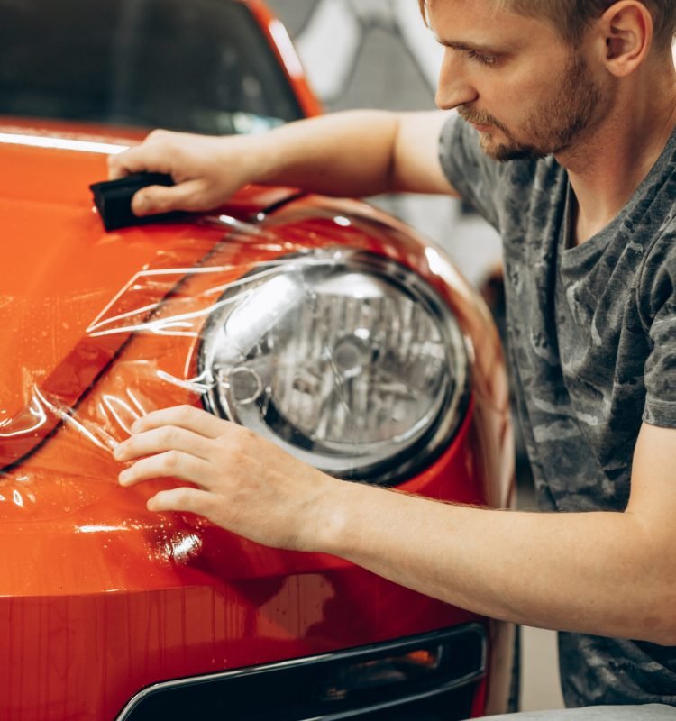 Car wrapping with foil at car service